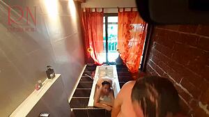 i spy on curvy housewife as she soaps up in shower and shaves her pussy in bath.