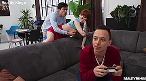 gamer grind reality kings follows a redhead european with short hair and tattoos in athletic doggystyle action