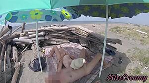 hey, can you believe this stepdaughter is jerking her stepdad's cock right on a tenerife nudist beach without any shame? 😲🍆