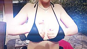 Sara jay's tale unfolds in dark bikini as she slides glass dildo deep inside her