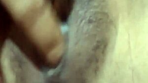 indonesian girl fingering her big pussy lips