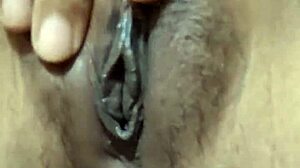 indonesian girl fingering her big pussy lips