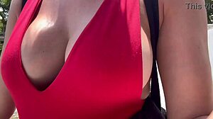 This hot horny Italian milf walks outdoors with her big boobs bouncing.