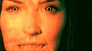 Why resist me turning you into my obedient sex slave? This tattooed dominatrix vampire controls your wet pussy with dirty talk and scissoring.