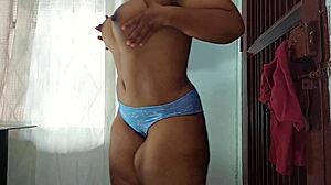 I love how this ebony mother with fat ass teases in lingerie, her beautiful milf body squirting while dancing seductively.