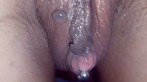 Curvy latina wife in lingerie and pierced nipples poses solo in homemade bath scene