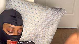 That ebony girl's squirting while watching xvideos, eyes rolling in wild orgasm