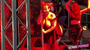 Whoa, this fat Spanish chica from the public crowd gets wild on stage with hot wax play outdoors! 🔥🕯️