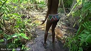 Skinny ebony tribe girl fucked hard by stream in forest nature spot