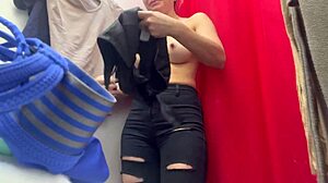 hidden cam catches big tits milf undressing in changing room