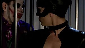 catwoman and partners tangle in cage threesome orgy