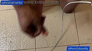 She's kneeling low while stroking herself into frenzy slowly