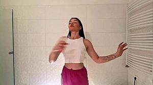 Stunning college brunette flashes white panties in short miniskirt voyeur tease