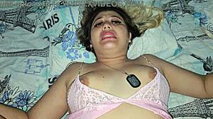 Blonde slips out of pajamas for sneaky bedtime fuck on soft sheets