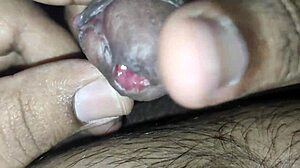 Inserting rod into tied foreskin peehole