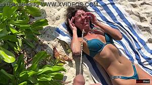 Pissing on shocked girl at public beach turns wild