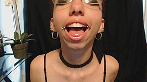goth teen 18+ spits drool on nude lipstick wanna see her wet tongue play?