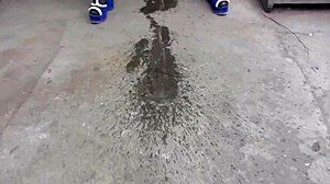 mature milf soaks jeans with golden shower piss in public garden outdoors