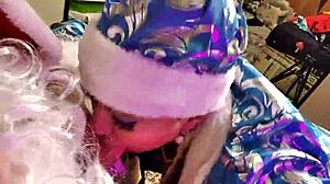 Aimee Santa Claus takes fat cock deep in Christmas closeup