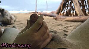 Stormy beach handjob leads to public cock cumshot orgasm