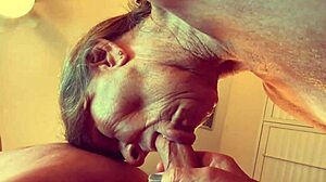 granny velma deepthroats HUGE COCK in open bathrobe