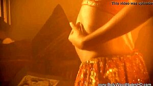 hey she's dancin n strippin lettin those exotic curves show