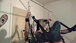 rhianna's chained up swinging her shaved pussy wild