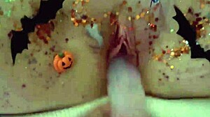 Wet halloween cosplay babe paints body and fingers pussy solo