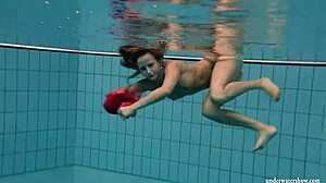 silvie dives in pool flashing big tits and hairy beaver